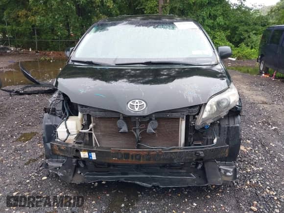 2012 Toyota Sienna SE with VIN 5TDXK3DCXCS179776, listed as a IAAI auction lot 42586784 with 165,919 mi miles and . Bid and sale history available at DreamBid. Image 13.