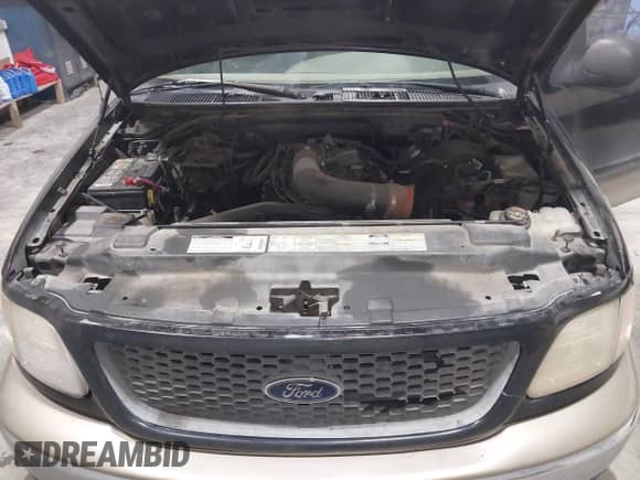 1999 Ford F-150 z VIN 1FTRX18W3XNB97325, wystawiony jako IAAI lot #42996400 z przebiegiem Nie podano mil oraz . Historia ofert i sprzedaży dostępna na DreamBid. Obrazek 10.