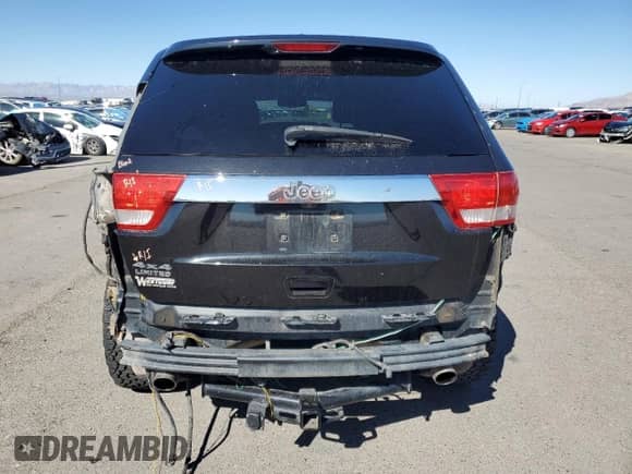 2012 Jeep Grand Cherokee Limited z VIN 1C4RJFBT5CC210966, wystawiony jako Copart lot #71712565 z przebiegiem 139 539 mil mil oraz Szkoda całkowita • Salvage title. Historia ofert i sprzedaży dostępna na DreamBid. Obrazek 6.
