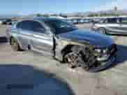 2019 BMW 5 Series 530e with VIN WBAJA9C5XKB253814, listed as a Copart auction lot 84608185 with 92,908 mi miles and Salvage title. Bid and sale history available at DreamBid. Image 4.