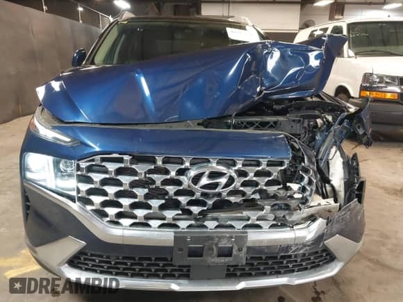 2021 Hyundai Santa Fe Limited with VIN 5NMS4DALXMH346589, listed as a IAAI auction lot 42412099 with 32,354 mi miles and . Bid and sale history available at DreamBid. Image 12.