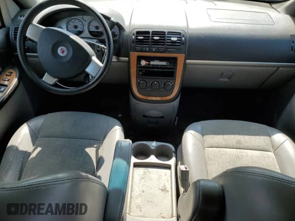 2006 Saturn Relay 2 FWD with VIN 5GZDV03L66D141096, listed as a Copart auction lot 64464345 with 198,698 mi miles and Salvage title. Bid and sale history available at DreamBid. Image 8.