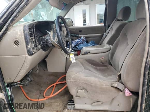 2001 GMC Sierra 1500 SLE z VIN 2GTEC19V411310370, wystawiony jako Copart lot #52950885 z przebiegiem 240 629 mil mil oraz Szkoda całkowita • Salvage title. Historia ofert i sprzedaży dostępna na DreamBid. Obrazek 7.