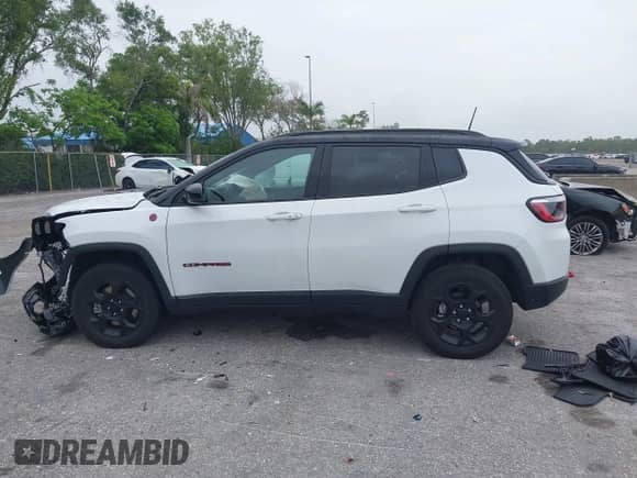 2023 Jeep Compass Trailhawk with VIN 3C4NJDDN8PT555422, listed as a IAAI auction lot 42430317 with 28,441 mi miles and . Bid and sale history available at DreamBid. Image 14.