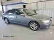 2006 Hyundai Azera SE с VIN KMHFC46F76A137763, выставлен на аукционе Copart как лот 82267215 с пробегом 146 719 миль миль и Списание • Salvage title. История ставок и продаж доступна на DreamBid. Изображение 4.
