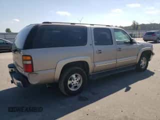 2003 Chevrolet Suburban LT z VIN 1GNEC16Z93J242638, wystawiony jako Copart lot #75521324 z przebiegiem 211 219 mil mil oraz Szkoda całkowita • Salvage title. Historia ofert i sprzedaży dostępna na DreamBid. Obrazek 3.