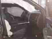 2018 Ram 1500 Rebel with VIN 1C6RR7YT1JS234777, listed as a IAAI auction lot 41409525 with 119,497 mi miles and . Bid and sale history available at DreamBid. Image 5.