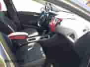 2018 Chevrolet Cruze LT z VIN 3G1BE6SM2JS558352, wystawiony jako IAAI lot #43300017 z przebiegiem 73 550 mil mil oraz . Historia ofert i sprzedaży dostępna na DreamBid. Obrazek 5.