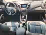 2013 Hyundai Veloster Turbo с VIN KMHTC6AE5DU169202, выставлен на аукционе Copart как лот 69867375 с пробегом 72 944 миль миль и Списание • Salvage title. История ставок и продаж доступна на DreamBid. Изображение 8.