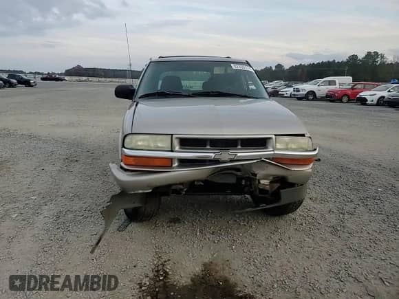 2003 Chevrolet Blazer LS с VIN 1GNCS13X53K148585, выставлен на аукционе Copart как лот 82339174 с пробегом 262 249 миль миль и Списание • Salvage title. История ставок и продаж доступна на DreamBid. Изображение 11.