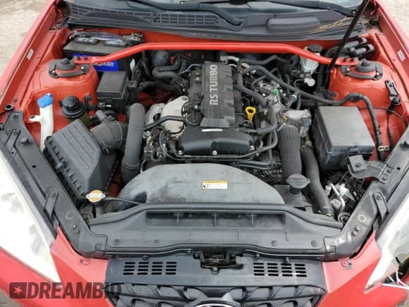 2012 Hyundai Genesis Coupe R-Spec z VIN KMHHT6KD8CU072635, wystawiony jako Copart lot #67398425 z przebiegiem 158 913 mil mil oraz Szkoda całkowita • Salvage title. Historia ofert i sprzedaży dostępna na DreamBid. Obrazek 11.