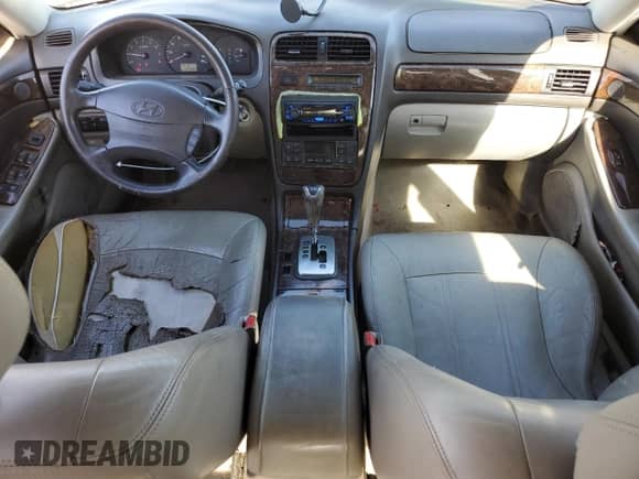 2003 Hyundai XG с VIN KMHFU45E63A259614, выставлен на аукционе Copart как лот 82042684 с пробегом 137 024 миль миль и Списание • Salvage title. История ставок и продаж доступна на DreamBid. Изображение 8.