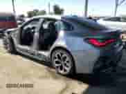 2024 BMW i4 eDrive35 with VIN WBY43AW05RFT55891, listed as a Copart auction lot 66478405 with 8,583 mi miles and Salvage title. Bid and sale history available at DreamBid. Image 2.