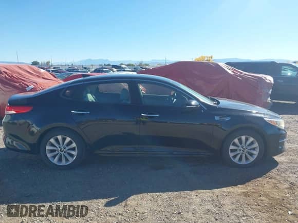 2016 Kia Optima EX with VIN 5XXGU4L39GG058908, listed as a IAAI auction lot 43449438 with 125,909 mi miles and . Bid and sale history available at DreamBid. Image 13.