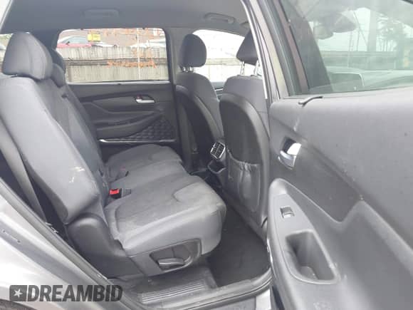 2019 Hyundai Santa Fe SEL with VIN 5NMS3CAD7KH134249, listed as a IAAI auction lot 42540889 with 142,411 mi miles and . Bid and sale history available at DreamBid. Image 8.