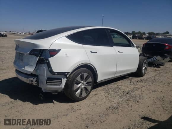 2023 Tesla Model Y Long Range с VIN 7SAYGDEE2PF662932, выставлен на аукционе Copart как лот 66630524 с пробегом 20 221 миль миль и Списание • Salvage title. История ставок и продаж доступна на DreamBid. Изображение 3.