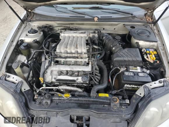 2003 Hyundai Tiburon GT с VIN KMHHN65F63U064962, выставлен на аукционе Copart как лот 44804045 с пробегом 186 171 миль миль и Списание • Salvage title. История ставок и продаж доступна на DreamBid. Изображение 12.