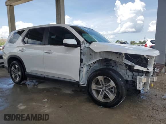2024 Honda Pilot EX-L with VIN 5FNYG2H55RB001346, listed as a Copart auction lot 61262575 with 12,523 mi miles and Salvage title. Bid and sale history available at DreamBid. Image 4.