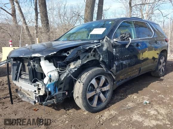 2018 Chevrolet Traverse LT с VIN 1GNEVHKWXJJ199472, выставлен на аукционе IAAI как лот 41499911 с пробегом 129 127 миль миль и . История ставок и продаж доступна на DreamBid. Изображение 6.