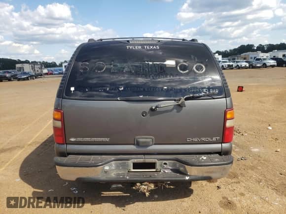 2002 Chevrolet Suburban LS z VIN 3GNEC16ZX2G133511, wystawiony jako Copart lot #74059784 z przebiegiem Nie podano mil oraz Szkoda całkowita • Salvage title. Historia ofert i sprzedaży dostępna na DreamBid. Obrazek 5.