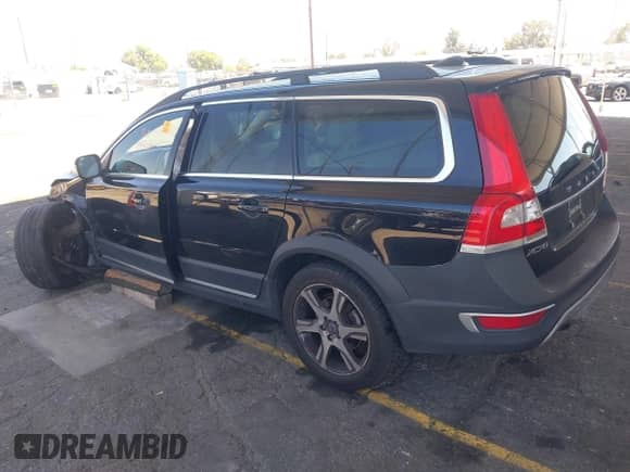 2015 Volvo XC70 T6 Platinum z VIN YV4902NMXF1209003, wystawiony jako IAAI lot #42897991 z przebiegiem 182 562 mil mil oraz . Historia ofert i sprzedaży dostępna na DreamBid. Obrazek 3.