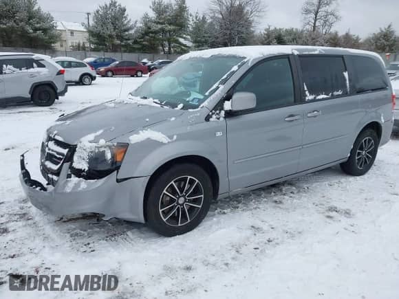 2014 Dodge Grand Caravan American Value with VIN 2C4RDGBG3ER406365, listed as a IAAI auction lot 41269127 with 88,102 mi miles and . Bid and sale history available at DreamBid. Image 2.