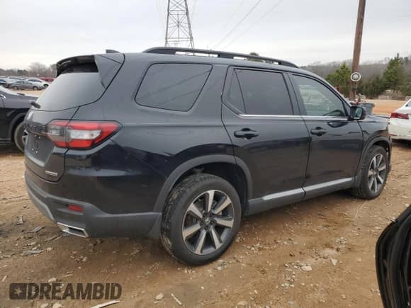 2023 Honda Pilot Touring with VIN 5FNYG2H70PB011362, listed as a Copart auction lot 44759765 with 19,676 mi miles and Salvage title. Bid and sale history available at DreamBid. Image 3.