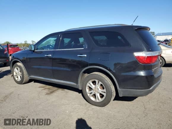 2013 Dodge Durango Crew with VIN 1C4RDJDG4DC700942, listed as a Copart auction lot 84470185 with 219,098 mi miles and Clean title. Bid and sale history available at DreamBid. Image 2.