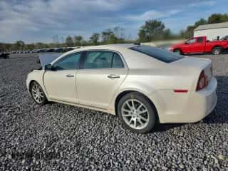 2012 Chevrolet Malibu LTZ с VIN 1G1ZG5E74CF284815, выставлен на аукционе Copart как лот 81940285 с пробегом 119 577 миль миль и Списание • Salvage title. История ставок и продаж доступна на DreamBid. Изображение 2.