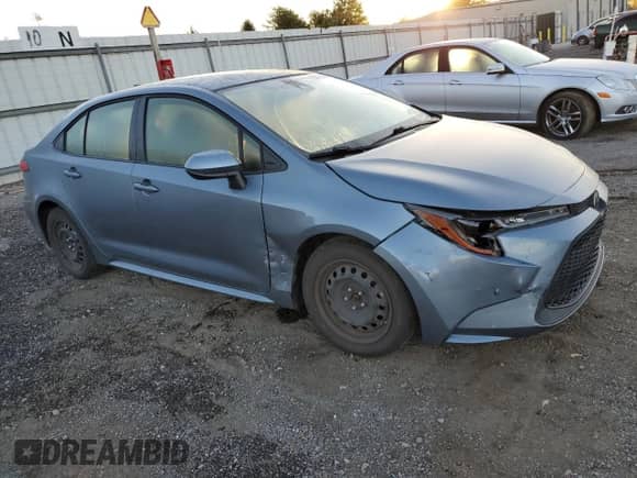2021 Toyota Corolla LE with VIN JTDEPMAE1MJ144336, listed as a Copart auction lot 82373205 with 55,917 mi miles and Salvage title. Bid and sale history available at DreamBid. Image 4.