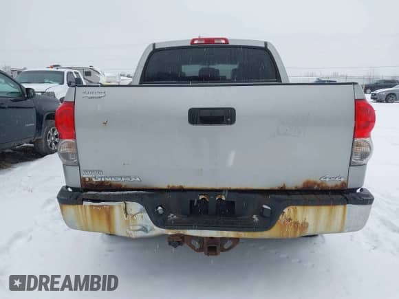 2008 Toyota Tundra with VIN 5TBDV54118S498651, listed as a IAAI auction lot 41139461 with 243,235 mi miles and . Bid and sale history available at DreamBid. Image 16.