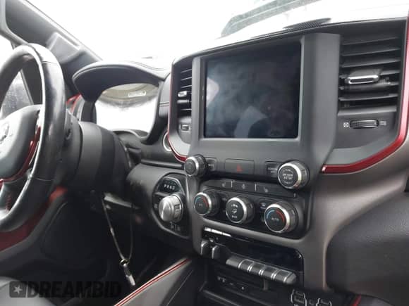 2019 Ram 1500 Rebel z VIN 1C6SRFLT9KN648795, wystawiony jako IAAI lot #38853577 z przebiegiem 75 292 mil mil oraz . Historia ofert i sprzedaży dostępna na DreamBid. Obrazek 19.