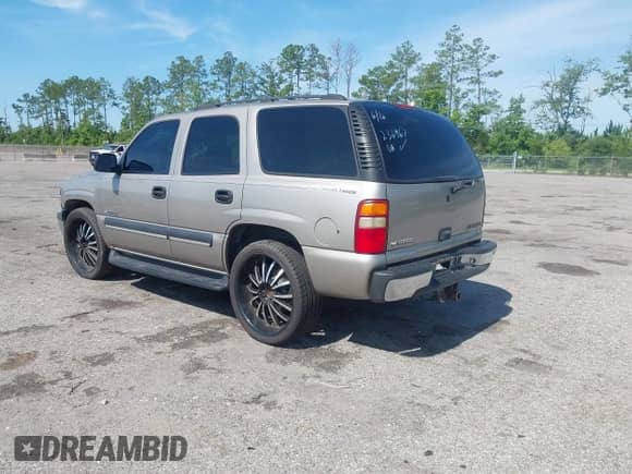 2003 Chevrolet Tahoe LT z VIN 1GNEC13Z13R236967, wystawiony jako IAAI lot #42541249 z przebiegiem 305 448 mil mil oraz . Historia ofert i sprzedaży dostępna na DreamBid. Obrazek 3.