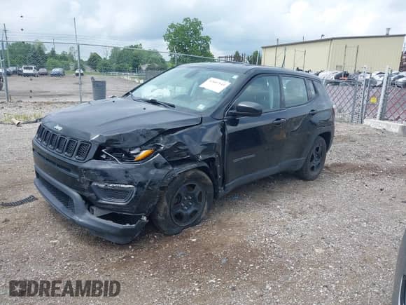 2018 Jeep Compass Sport with VIN 3C4NJCAB2JT187010, listed as a IAAI auction lot 42607545 with 94,715 mi miles and . Bid and sale history available at DreamBid. Image 17.