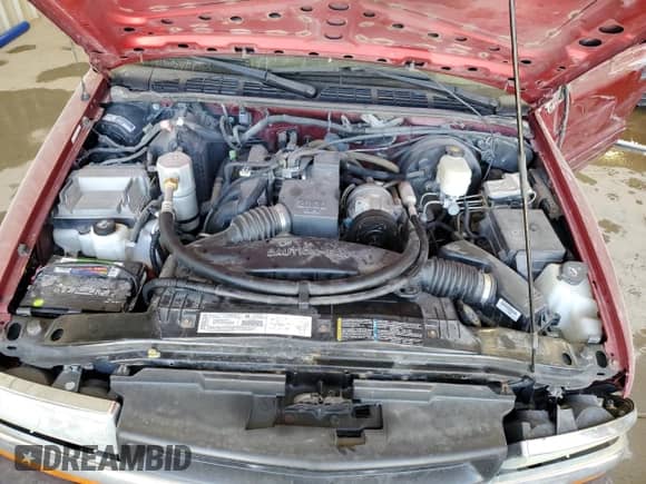 2003 Chevrolet S-10 z VIN 1GCCS19H938189002, wystawiony jako Copart lot #56165325 z przebiegiem 152 275 mil mil oraz Nie do naprawy • Non repairable. Historia ofert i sprzedaży dostępna na DreamBid. Obrazek 11.