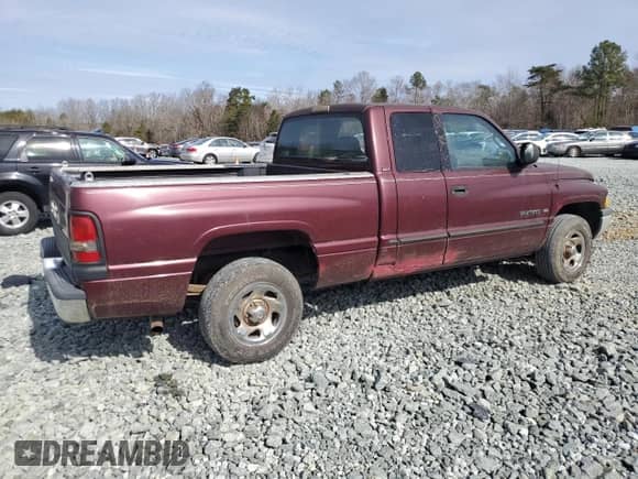 2000 Dodge 1500 with VIN 1B7HC13Y4YJ104983, listed as a Copart auction lot 45980265 with 164,727 mi miles and Clean title. Bid and sale history available at DreamBid. Image 3.