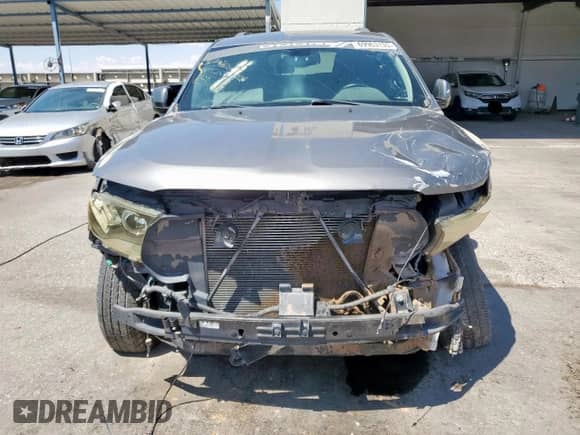 2011 Dodge Durango Crew z VIN 1D4RD4GG9BC740334, wystawiony jako Copart lot #69963135 z przebiegiem 163 267 mil mil oraz Szkoda całkowita • Salvage title. Historia ofert i sprzedaży dostępna na DreamBid. Obrazek 5.