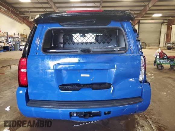 2020 Chevrolet Tahoe Commercial with VIN 1GNSKDEC9LR247733, listed as a Copart auction lot 81214625 with 73,557 mi miles and Salvage title. Bid and sale history available at DreamBid. Image 6.