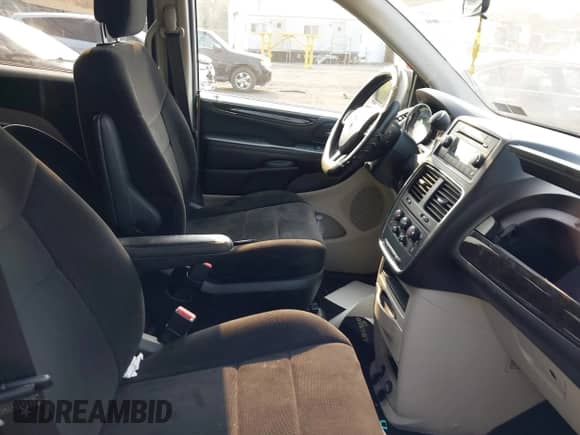 2013 Dodge Grand Caravan SE with VIN 2C4RDGBG2DR792176, listed as a IAAI auction lot 42935102 with 105,683 mi miles and . Bid and sale history available at DreamBid. Image 5.