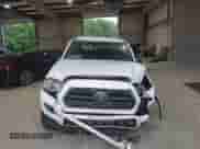 2018 Toyota Tacoma SR5 with VIN 5TFRZ5CN2JX058282, listed as a IAAI auction lot 42633438 with 94,071 mi miles and . Bid and sale history available at DreamBid. Image 12.