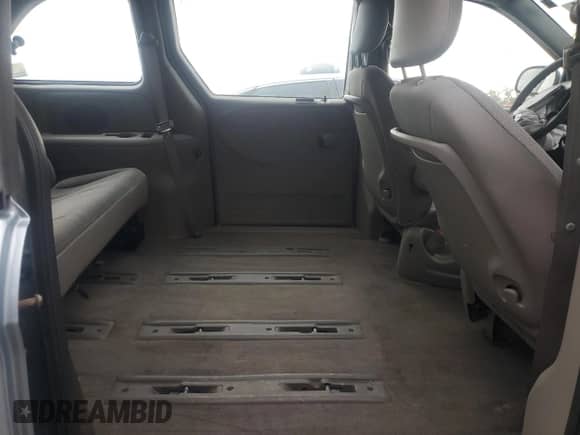 2003 Dodge Caravan with VIN 1D8GP25BX3B305676, listed as a Copart auction lot 65971805 with 240,020 mi miles and Salvage title. Bid and sale history available at DreamBid. Image 11.