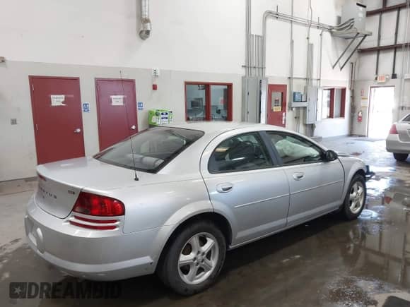 2005 Dodge Stratus SXT with VIN 1B3EL46R25N679632, listed as a IAAI auction lot 42328715 with 118,778 mi miles and . Bid and sale history available at DreamBid. Image 4.
