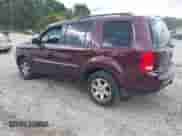 2011 Honda Pilot Touring with VIN 5FNYF4H92BB050639, listed as a IAAI auction lot 43329338 with 171,365 mi miles and . Bid and sale history available at DreamBid. Image 3.