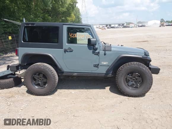 2014 Jeep Wrangler Sahara с VIN 1C4AJWBG5EL141201, выставлен на аукционе IAAI как лот 42873077 с пробегом 111 632 миль миль и . История ставок и продаж доступна на DreamBid. Изображение 13.
