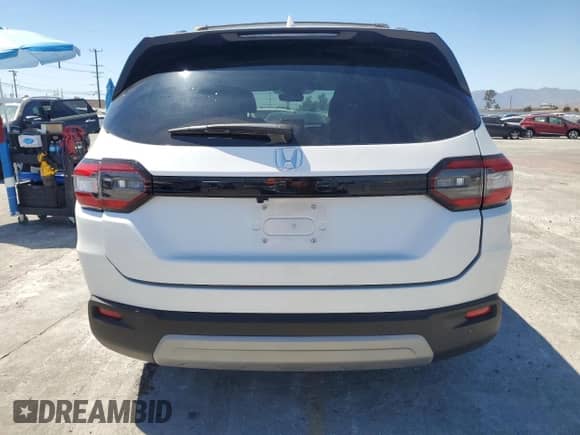 2023 Honda Pilot EX-L z VIN 5FNYG2H51PB016228, wystawiony jako Copart lot #63607195 z przebiegiem 32 468 mil mil oraz Szkoda całkowita • Salvage title. Historia ofert i sprzedaży dostępna na DreamBid. Obrazek 6.