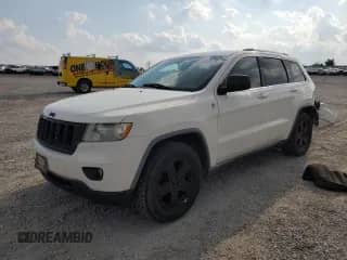 2011 Jeep Grand Cherokee Laredo z VIN 1J4RR4GG2BC617838, wystawiony jako Copart lot #72069035 z przebiegiem 186 984 mil mil oraz Szkoda całkowita • Salvage title. Historia ofert i sprzedaży dostępna na DreamBid. Obrazek 1.