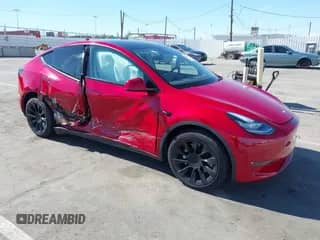 2022 Tesla Model Y Long Range z VIN 7SAYGDEE2NF352440, wystawiony jako IAAI lot #43041054 z przebiegiem 46 950 mil mil oraz . Historia ofert i sprzedaży dostępna na DreamBid. Obrazek 1.