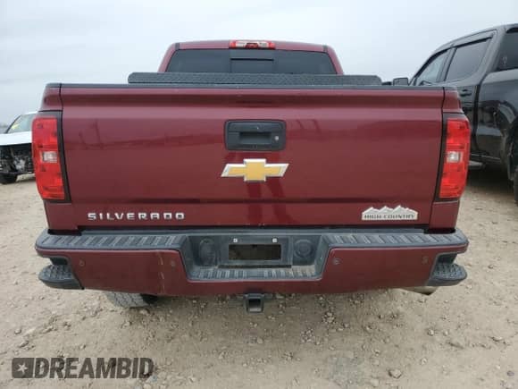 2014 Chevrolet Silverado 1500 High Country z VIN 3GCPCTEC4EG340233, wystawiony jako Copart lot #45569845 z przebiegiem Nie podano mil oraz Szkoda całkowita • Salvage title. Historia ofert i sprzedaży dostępna na DreamBid. Obrazek 6.