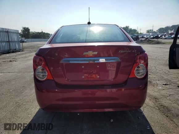2016 Chevrolet Sonic LT with VIN 1G1JC5SH5G4185377, listed as a Copart auction lot 68824545 with 98,566 mi miles and Clean title. Bid and sale history available at DreamBid. Image 6.