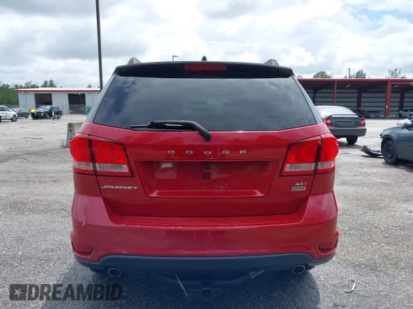 2015 Dodge Journey SXT with VIN 3C4PDCBGXFT743615, listed as a IAAI auction lot 43374385 with 124,970 mi miles and . Bid and sale history available at DreamBid. Image 16.